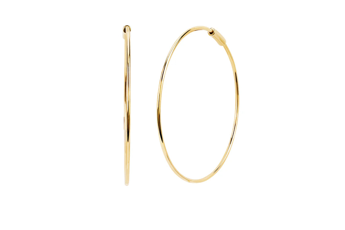 EF Collection The Perfect Gold Hoop Earrings in yellow gold on white background. 