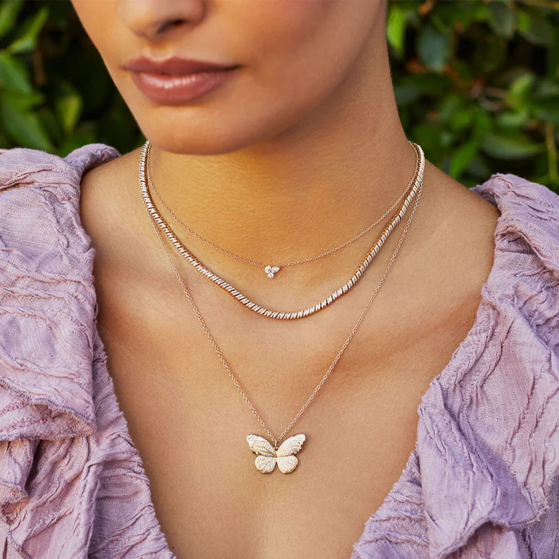 EF Collection Triple Diamond Cluster Necklace in yellow gold styled on models neck.