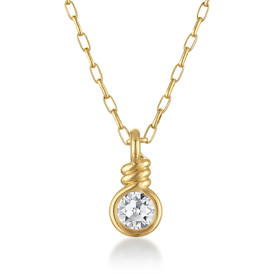 Rosario Navia Twist Pendant Round Brilliant Diamond in yellow gold on white background.